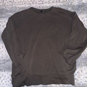 Men’s or Women’s Brand New Condition Camo green  Crew Neck Sweater. Men’s Size L